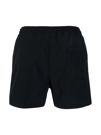 Shop Msgm Logo-print Swim Shorts In Schwarz