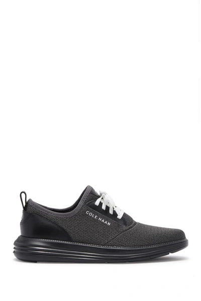 Shop Cole Haan Grandsport Journey Knit Sneaker In Black Magnet Optic White