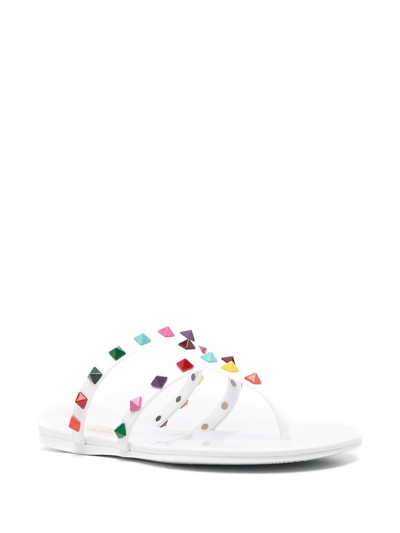 Shop Valentino Rockstud Thong Flat Sandals In White