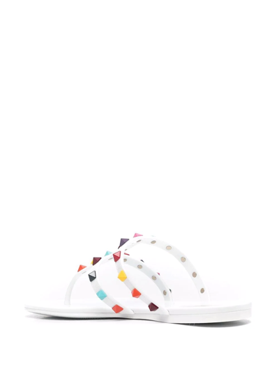 Shop Valentino Rockstud Thong Flat Sandals In White