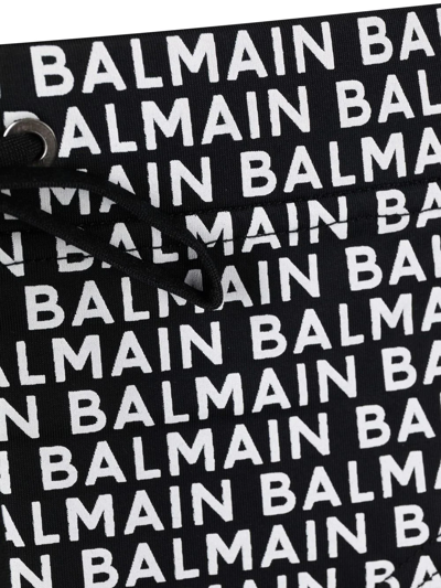 Shop Balmain Logo Drawstring Swim Briefs In Schwarz