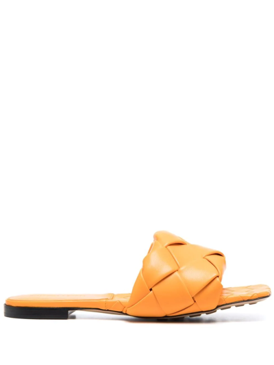 Shop Bottega Veneta Lido Intrecciato Flat Sandals In Orange