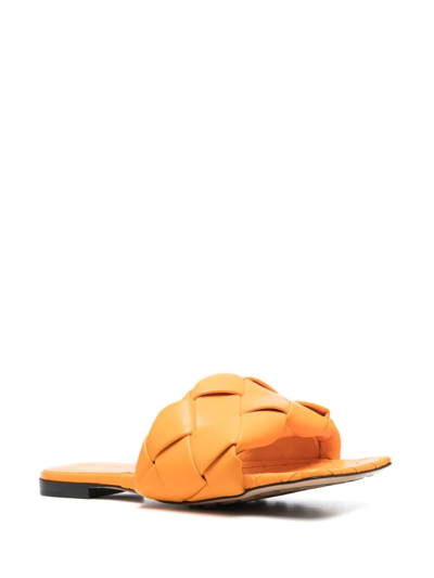 Shop Bottega Veneta Lido Intrecciato Flat Sandals In Orange