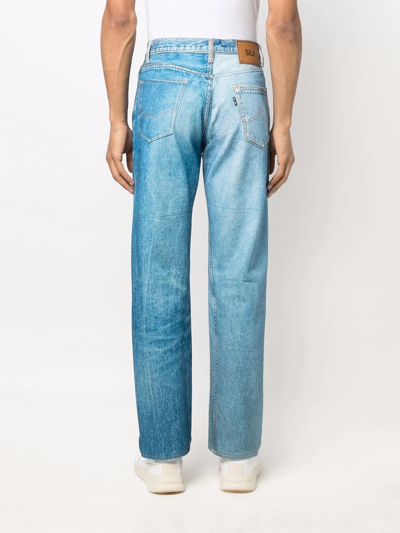 Shop Doublet Ripped-detail Denim Jeans In Blue