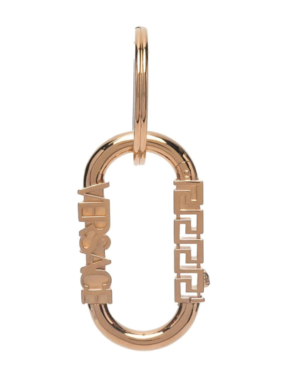 Shop Versace Logo Charm Keychain In Gold