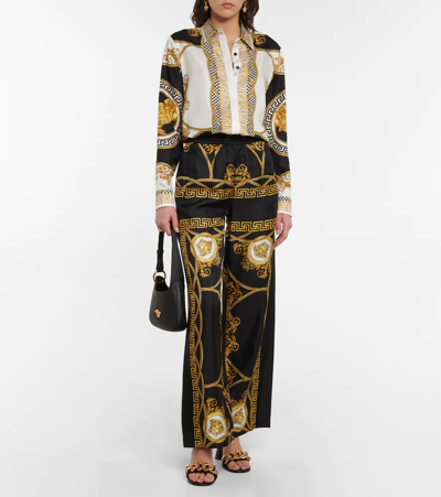 Shop Versace La Coupe Des Dieux Print Pants In Nero+oro