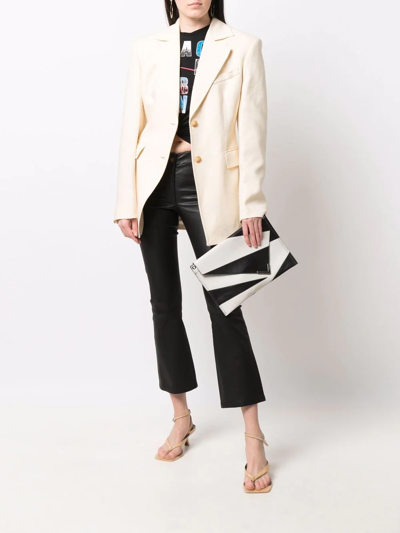 Arma Cropped Flared Trousers In Schwarz