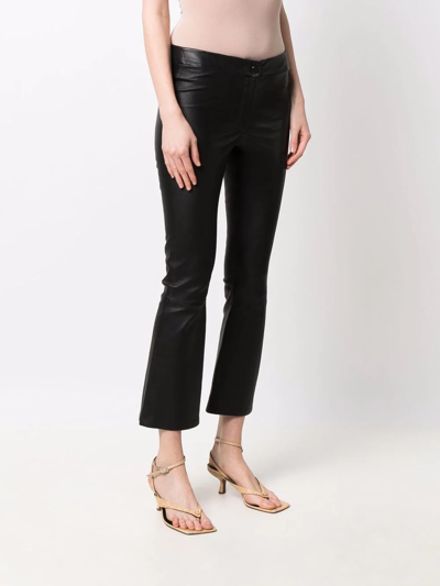 Shop Arma Cropped Flared Trousers In Schwarz