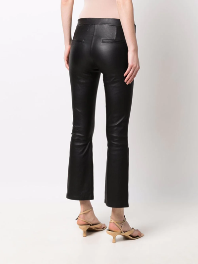 Shop Arma Cropped Flared Trousers In Schwarz