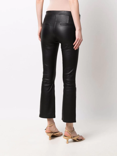 Arma Cropped Flared Trousers In Schwarz