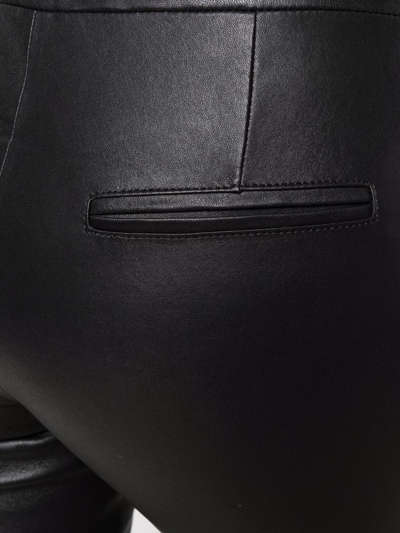 Arma Cropped Flared Trousers In Schwarz