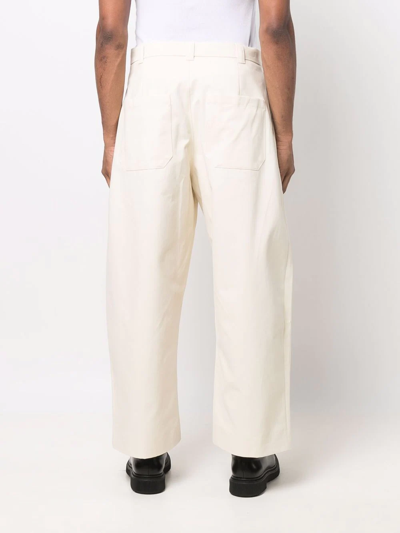 Studio Nicholson Sorte Wide-leg Pleated Trousers In Nude