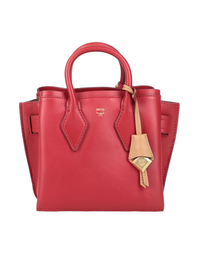 Shop Mcm Handbags In Red