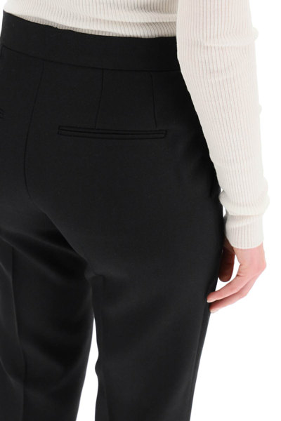 Shop Wardrobe.nyc Stirrup Tailored Trousers In Black