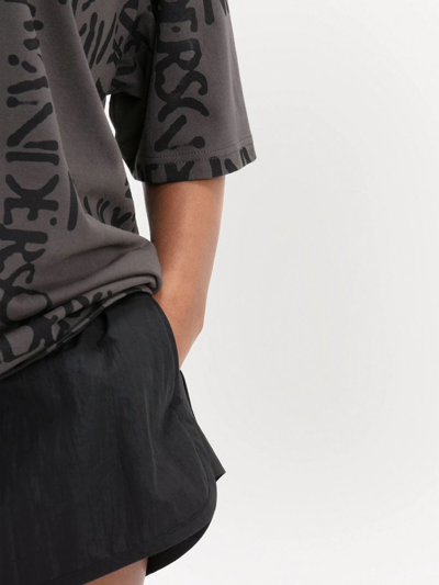 Jw Anderson Black Oversized Running Shorts In Black