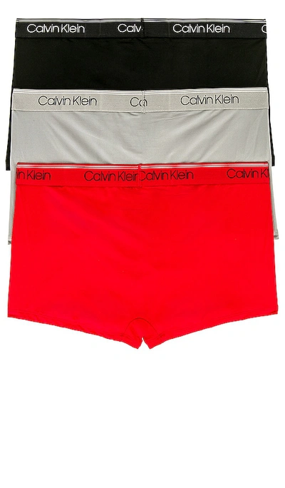 Shop Calvin Klein Underwear Calvin Klein Low Rise Trunk 3 Piece Set In Black  Convoy  & Red Gala