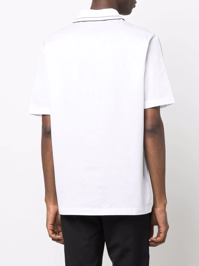 Shop Ferragamo Logo-collar Polo Shirt In White