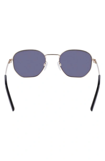 Shop Converse Elevate 52mm Round Sunglasses In Gold/ Matte Black