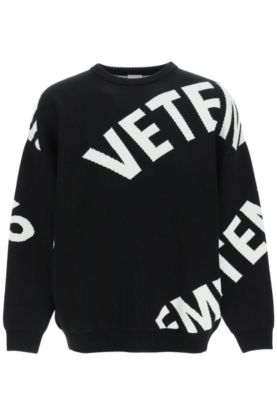 Shop Vetements Maxi Logo Sweater In Black (black)