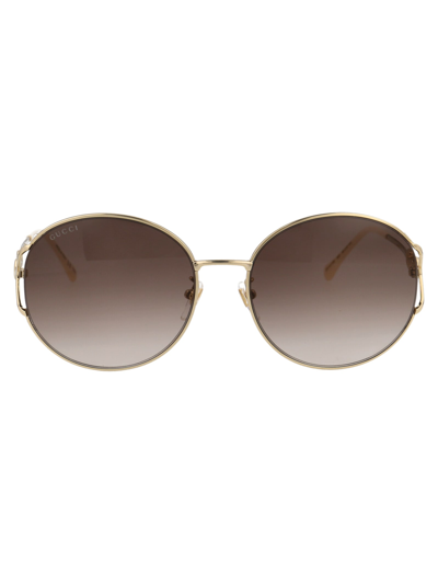 Shop Gucci Eyewear Gg1017sk Sunglasses In 003 Gold Gold Brown
