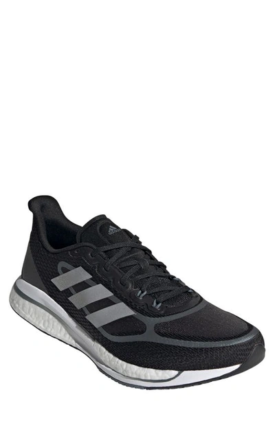 Shop Adidas Originals Supernova Running Shoe In Core Black/ Silver Met./blue