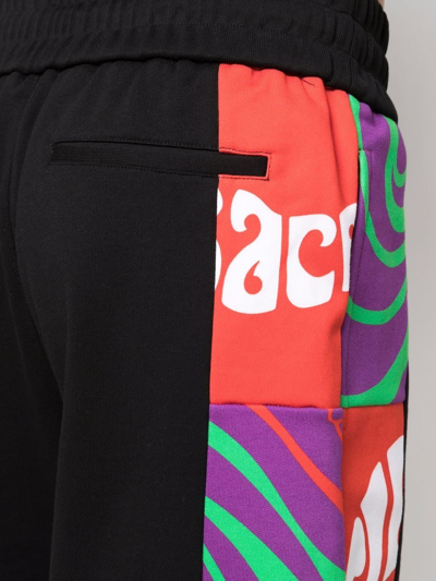 Shop Versace Abstract-print Cotton Track Shorts In Black