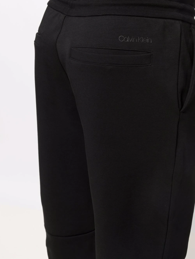 Shop Calvin Klein Logo-print Joggers In Black
