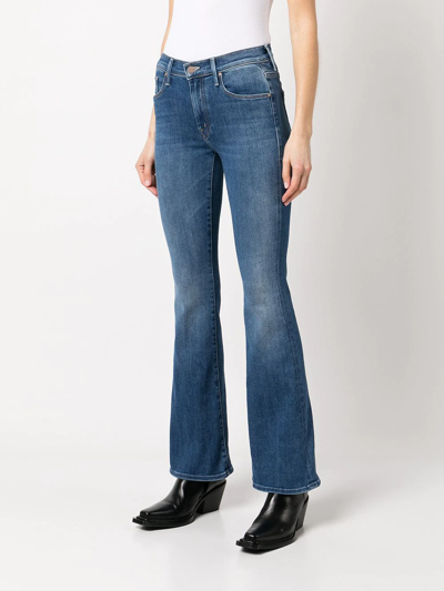 Shop Mother Low-rise Flared Jeans In Blue