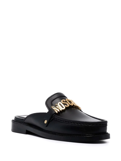 Shop Moschino Logo-lettering Leather Mules In Black