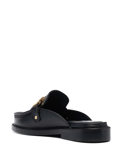 Shop Moschino Logo-lettering Leather Mules In Black