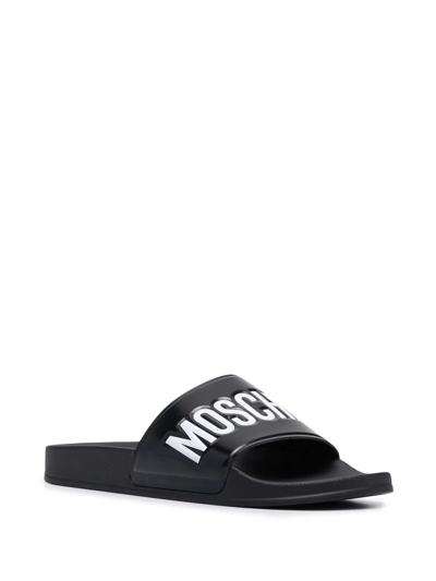 Shop Moschino Logo-debossed Pool Slides In Black