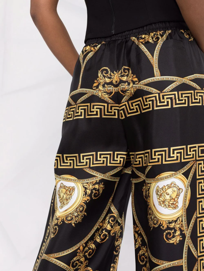 Shop Versace La Coupe Des Dieux-print Wide-leg Silk Trousers In Schwarz