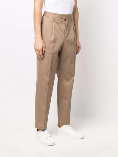 Neil Barrett One Pleat Loose Estra Low Rise Trousers In Braun