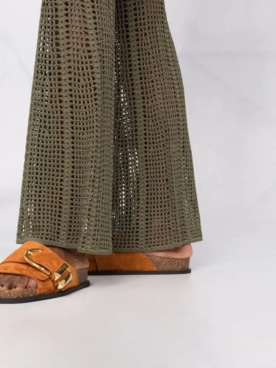 Shop Dion Lee Crochet-design Flared Trousers In Grün