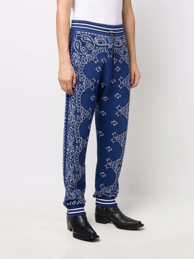 Amiri Tapered Bandana-jacquard Cotton And Cashmere-blend Sweatpants In Blau