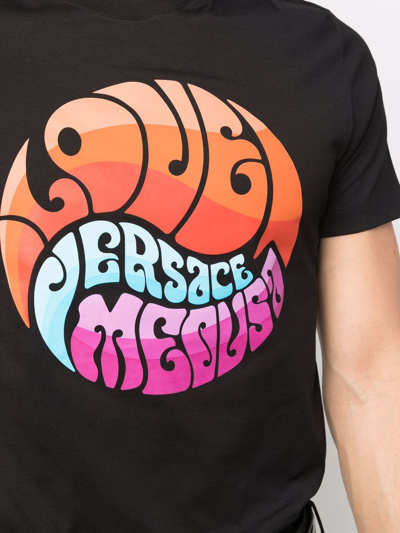 Shop Versace Medusa Graphic Slogan-print T-shirt In Black