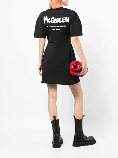 Shop Alexander Mcqueen Logo-print Skater Mini Dress In Black