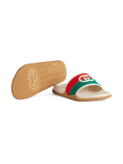 Shop Gucci Logo-debossed Slides In White