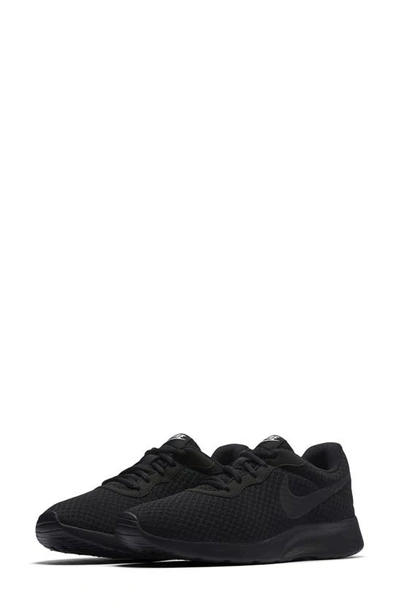 Shop Nike Tanjun Sneaker In 002 Black-black