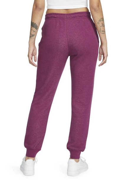 Shop Nike Sportswear Essential Fleece Pants In Sangria/ Heather/ White