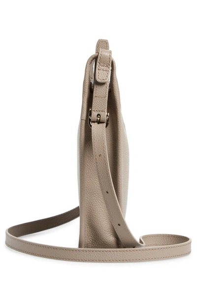 Shop Longchamp Small Le Foulonné Leather Crossbody Bag In Turtle Dove