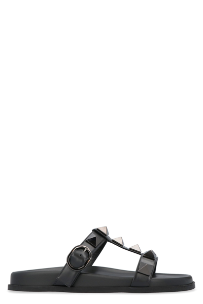 Shop Valentino Garavani - Roman Stud Leather Slides In Black