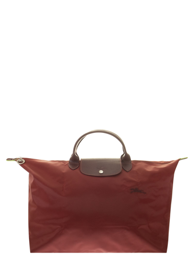 Shop Longchamp Le Pliage Green - Travel Bag L In Red