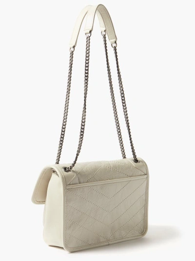 YSL Niki MM Distressed leather in cream, Luxury, Bags & Wallets on