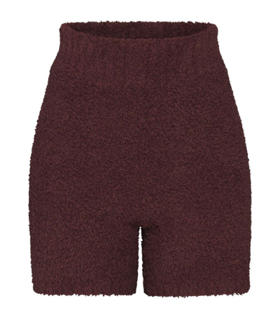 Shop Skims Cozy Knit Shorts In Brown