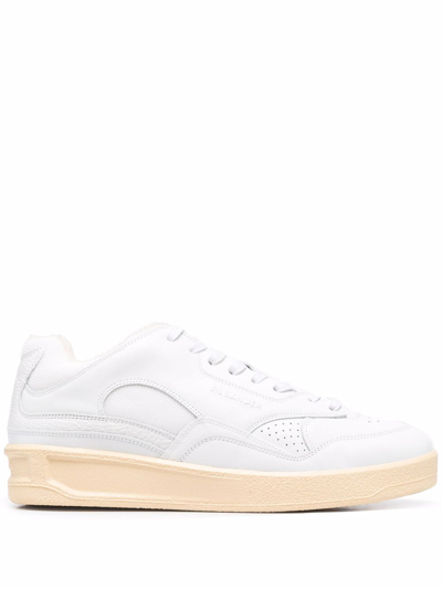 Shop Jil Sander Logo-embossed Low-top Sneakers In White