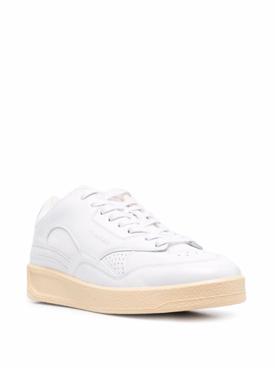 Shop Jil Sander Logo-embossed Low-top Sneakers In White