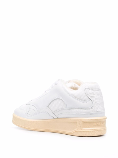 Shop Jil Sander Logo-embossed Low-top Sneakers In White