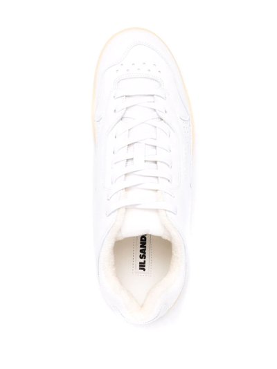 Shop Jil Sander Logo-embossed Low-top Sneakers In White