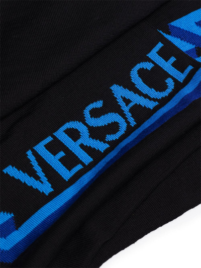 Shop Versace Greca-motif Wool Scarf In Schwarz
